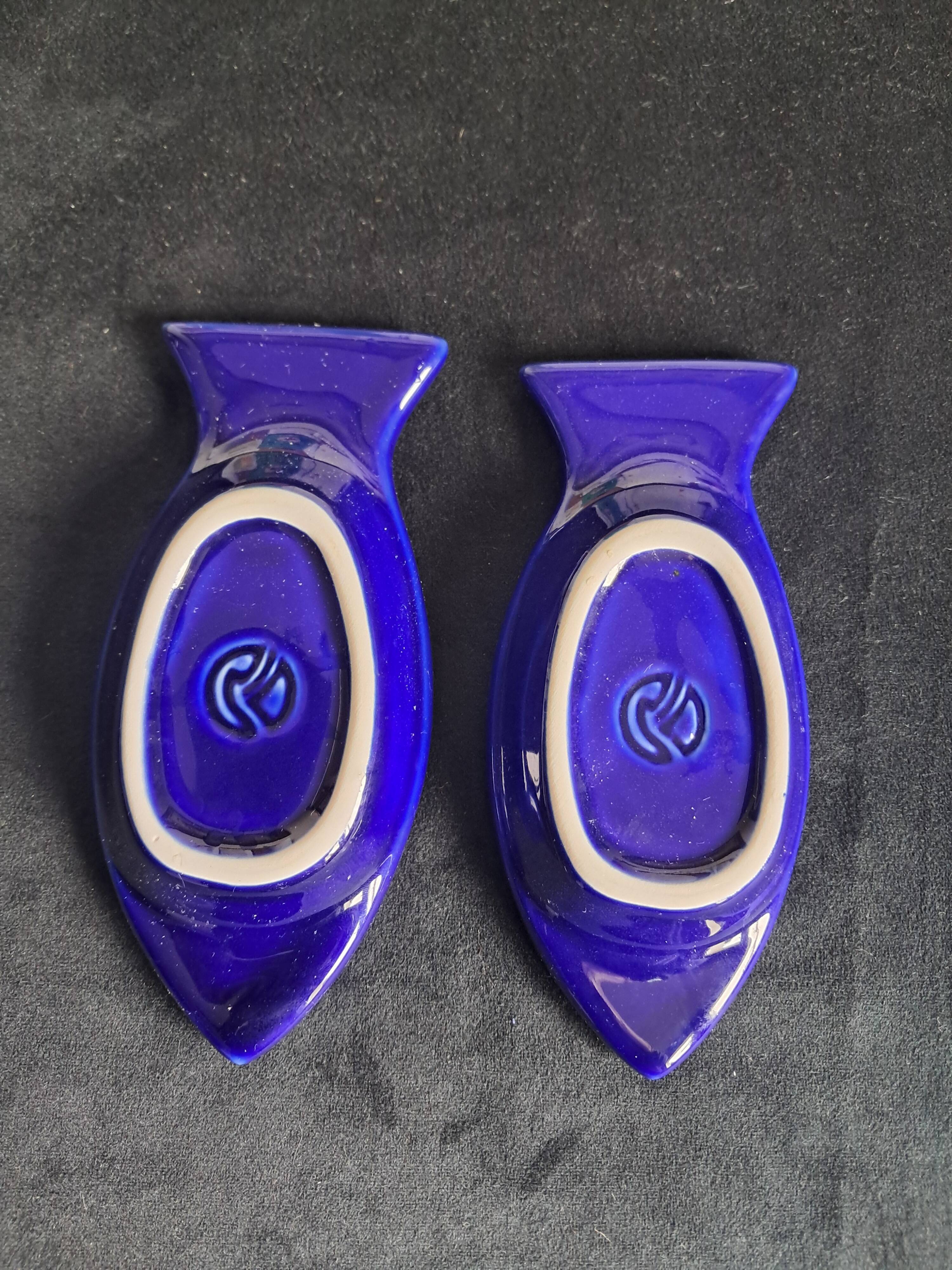 Cobalt blue ceramic plates in the shape of fish (tapas, anchovies, etc.)