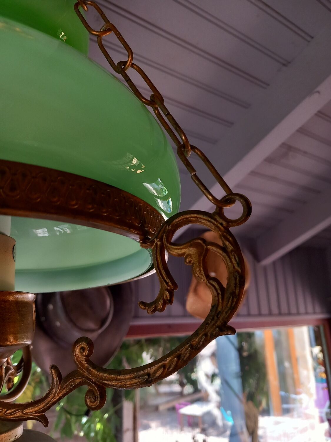 Old green opaline chandelier, gold metal and earthenware