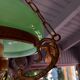 Old green opaline chandelier, gold metal and earthenware