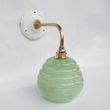 Brass collar and speckled glass wall lamp