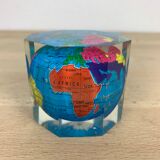 Globe paper press under resin