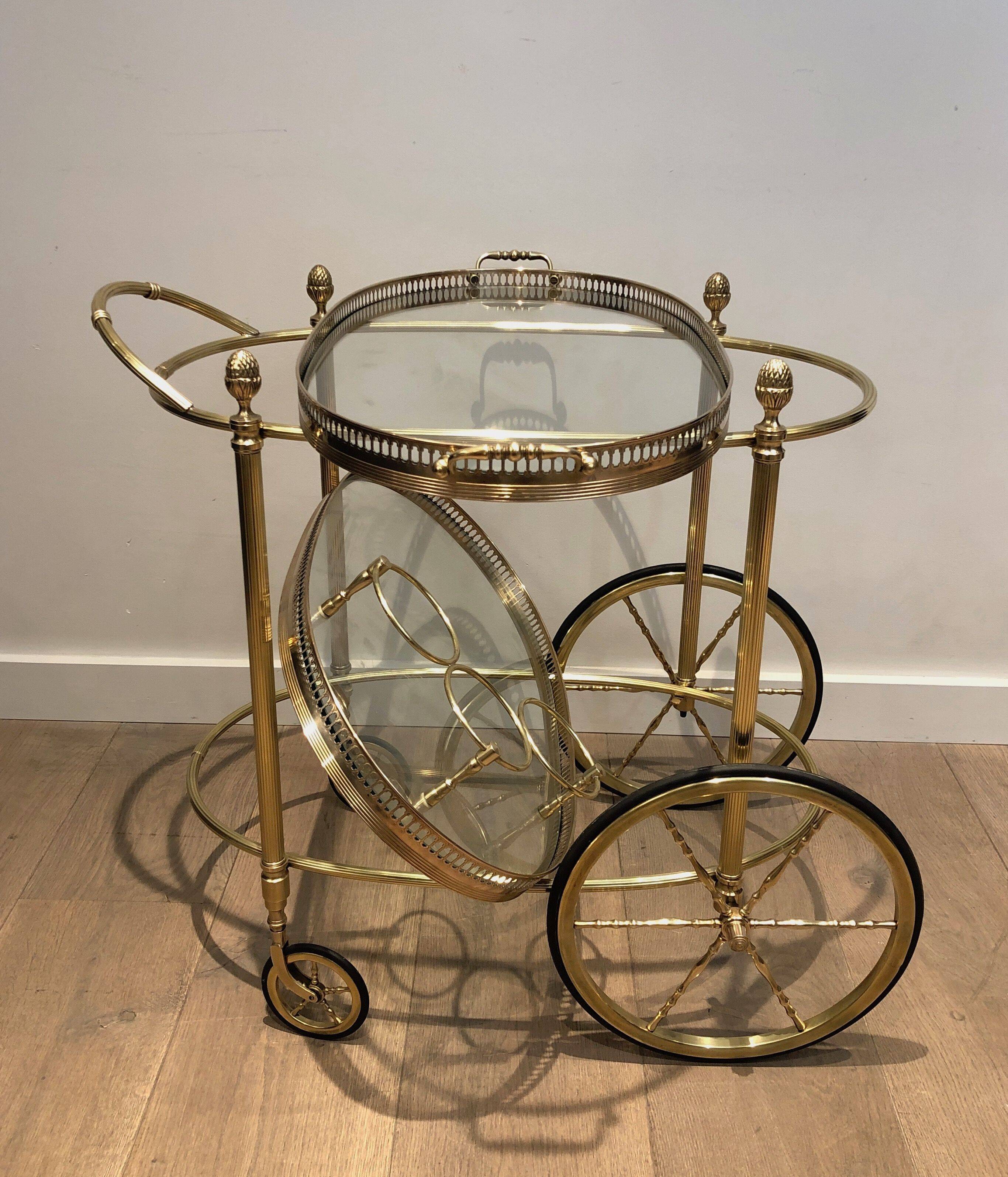 Oval brass trolley from Maison Baguès.