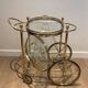 Oval brass trolley from Maison Baguès.
