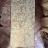 Brass coffee table with shaded lacquer top