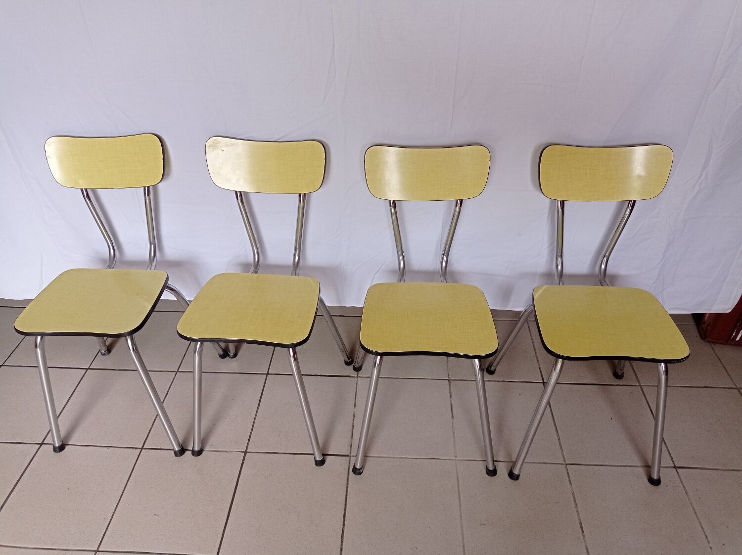 4 yellow Formica chairs