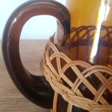 Brown glass decanter/pitcher with 70s wicker basket