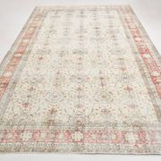 Tapis persan vintage à motif floral