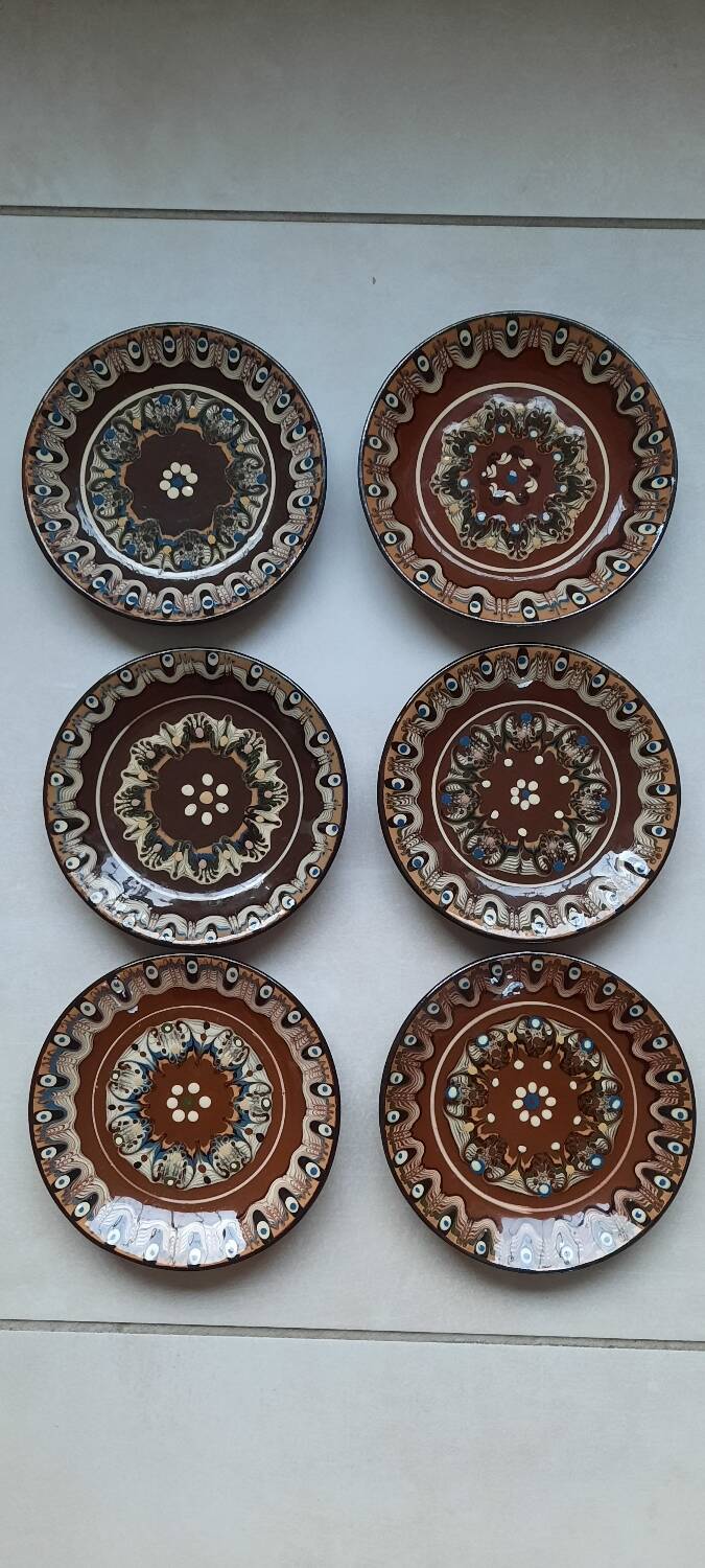 Hand painted pottery plates
