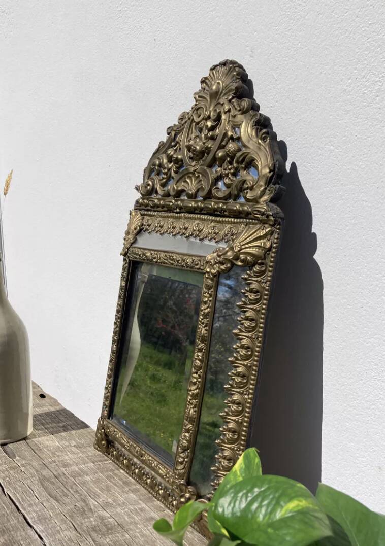 Golden mirror with 19th century embossed brass beads