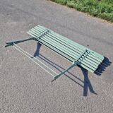 Old wrought iron folding bench