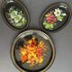 Set of three painted sheet metal trays