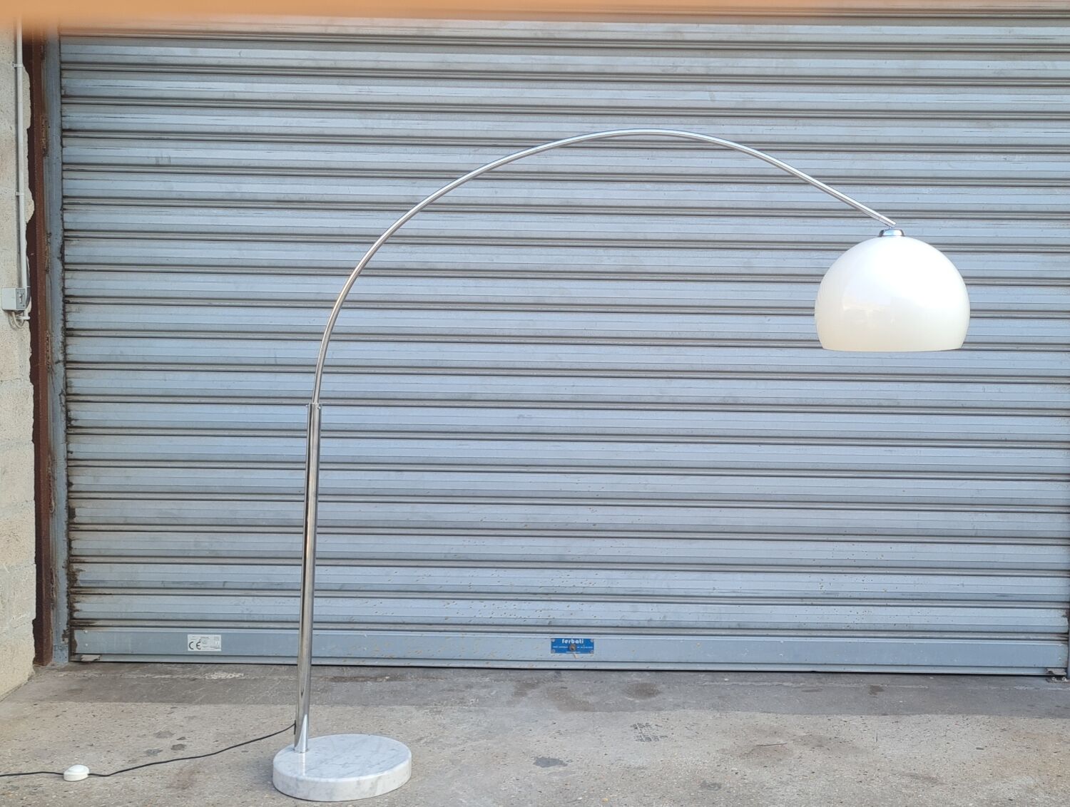 Arch floor lamp by Harvey guzzini 1970