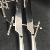 Set of 12 knife rests