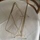 Vintage gold metal magazine rack