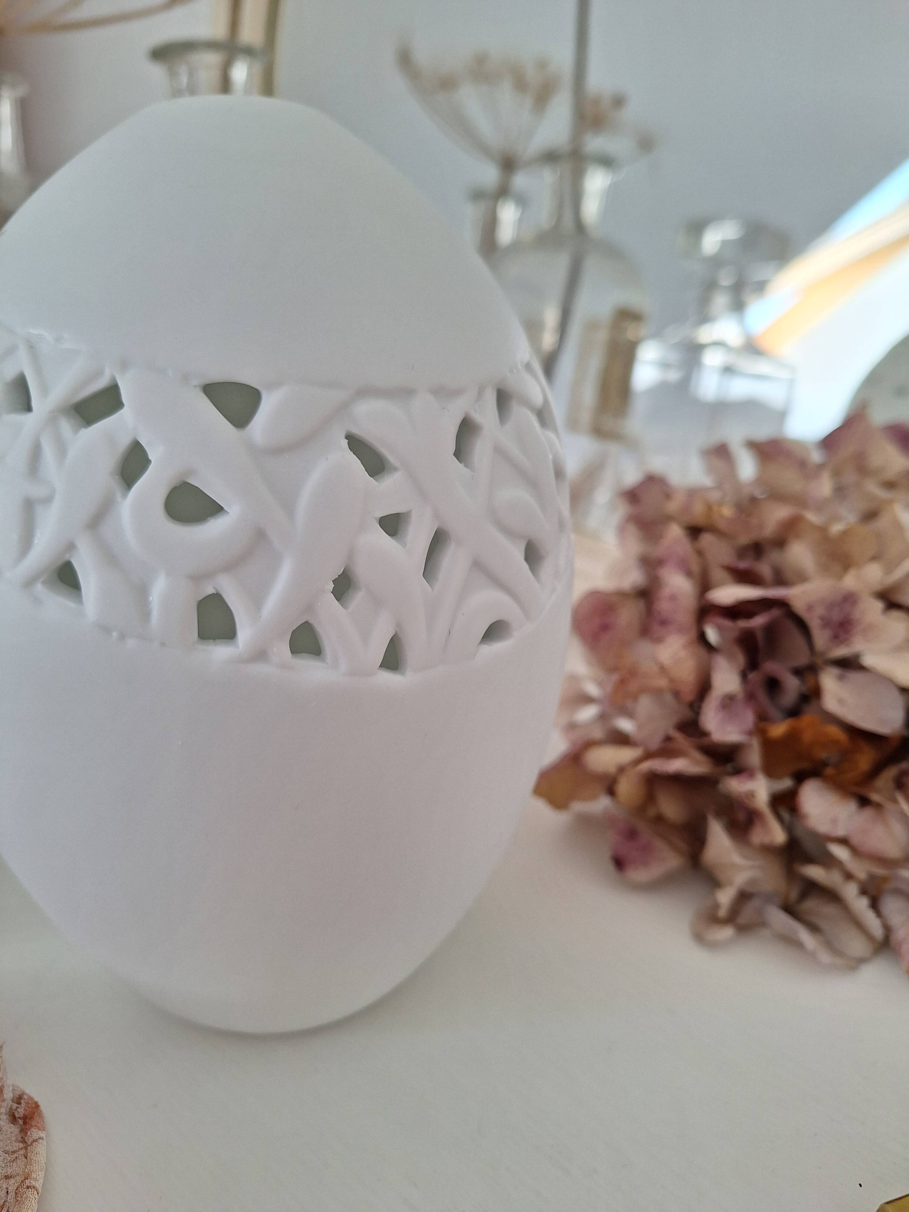 White porcelain egg vase