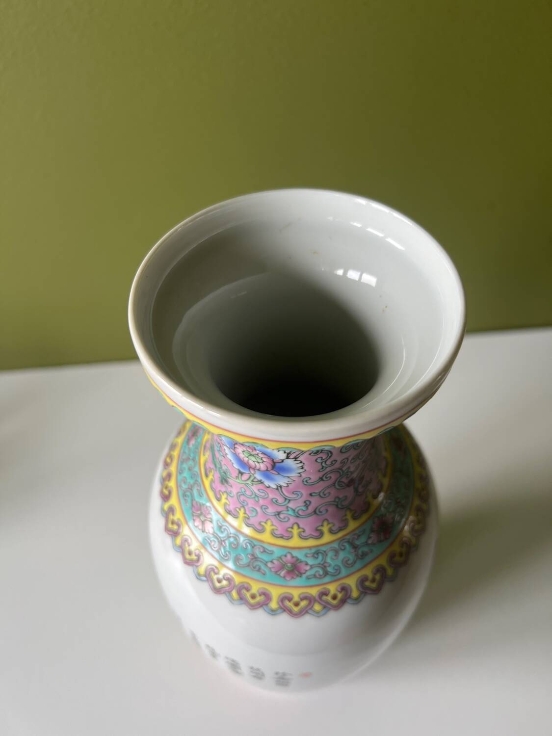 Chinese peacock vase with foliage