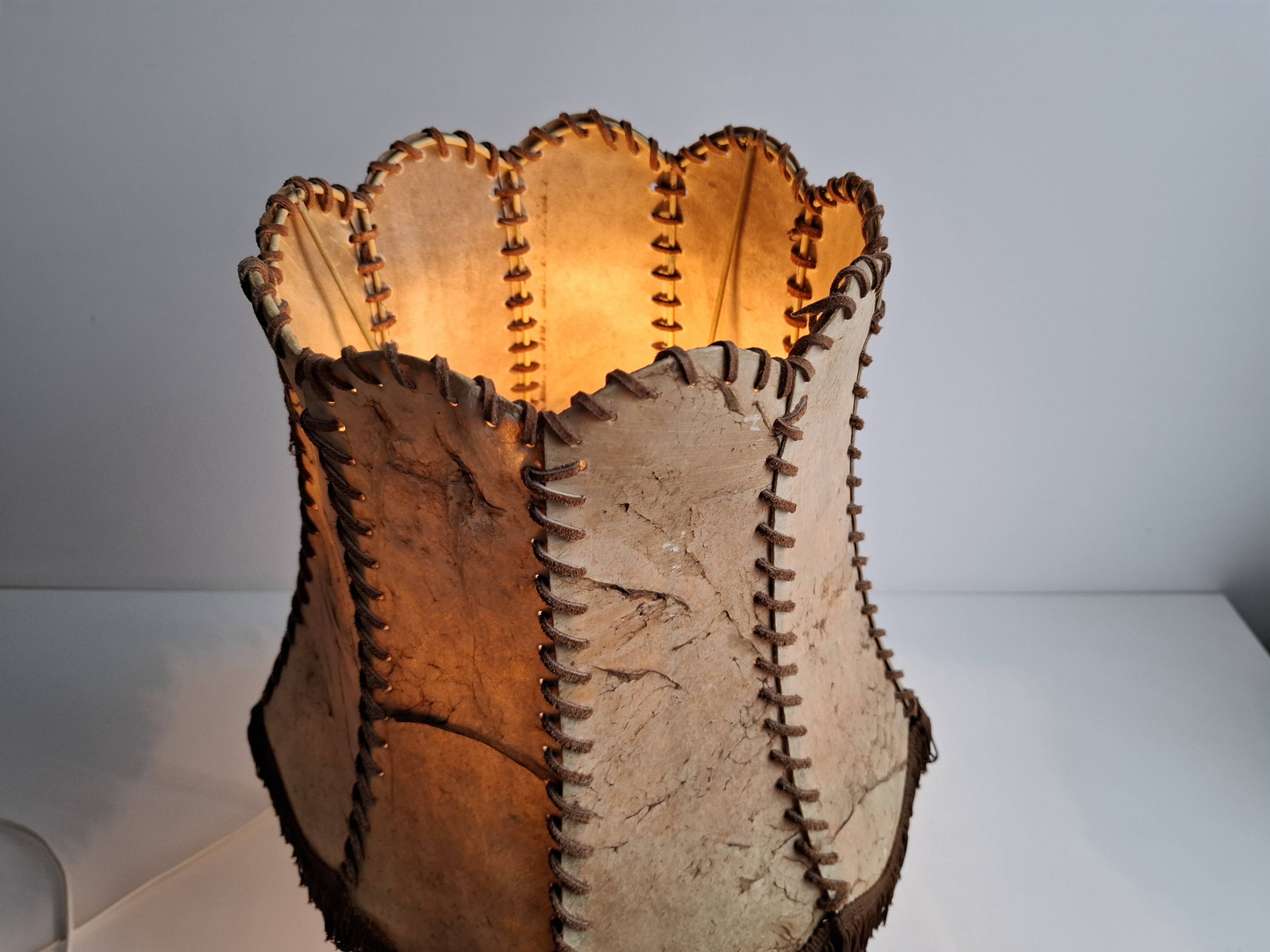 Vintage ceramic table lamp with hand-stitched leather shade, 1980s.