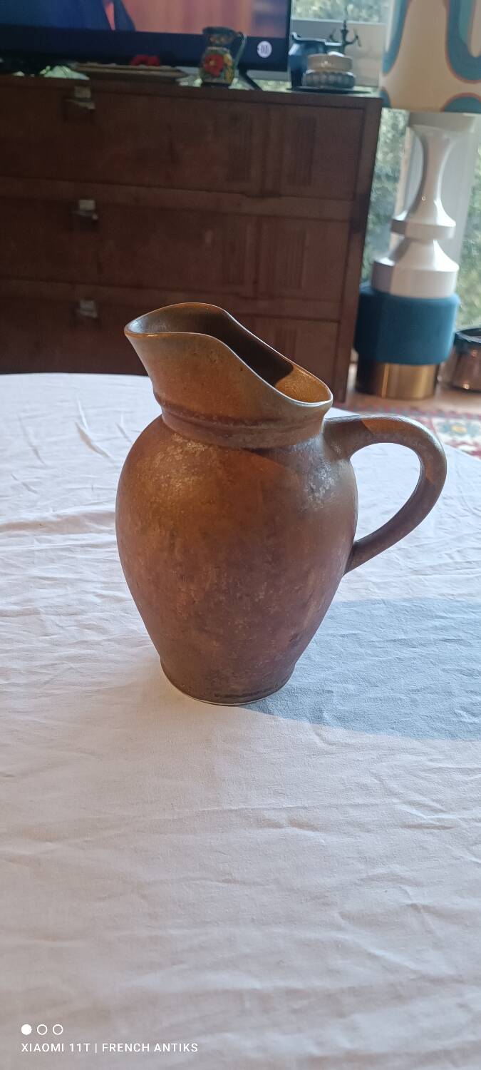 Jug, iridescent glazed stoneware carafe.