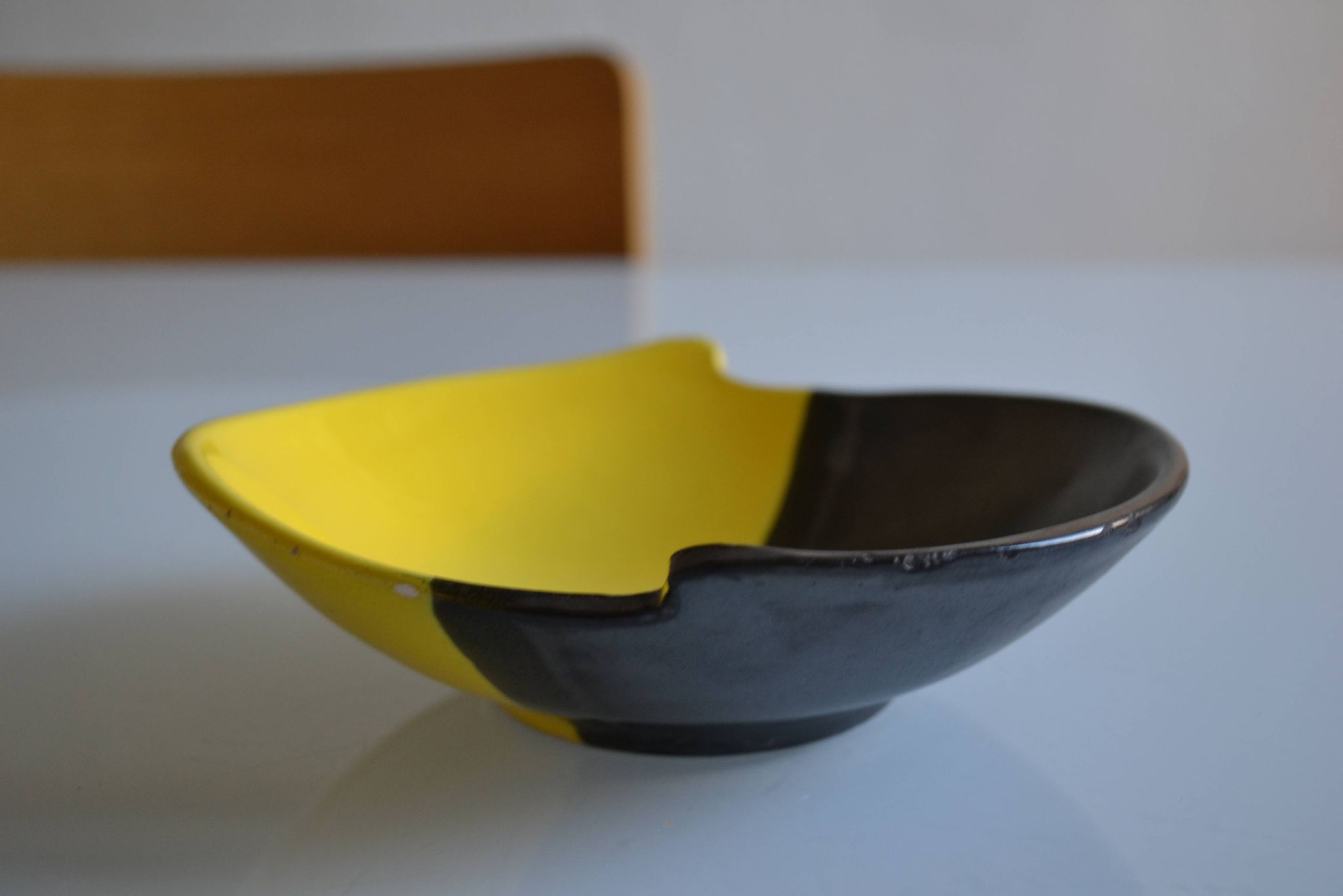 Bicolour ceramic cup in black and yellow signed Luc Vallauris 1950
