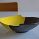 Bicolour ceramic cup in black and yellow signed Luc Vallauris 1950