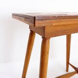 Vintage wooden side table with terracotta top