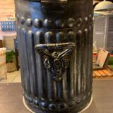 Coal tray decorated in black sheet metal