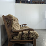 Rustic solid oak sofa with floral decoration