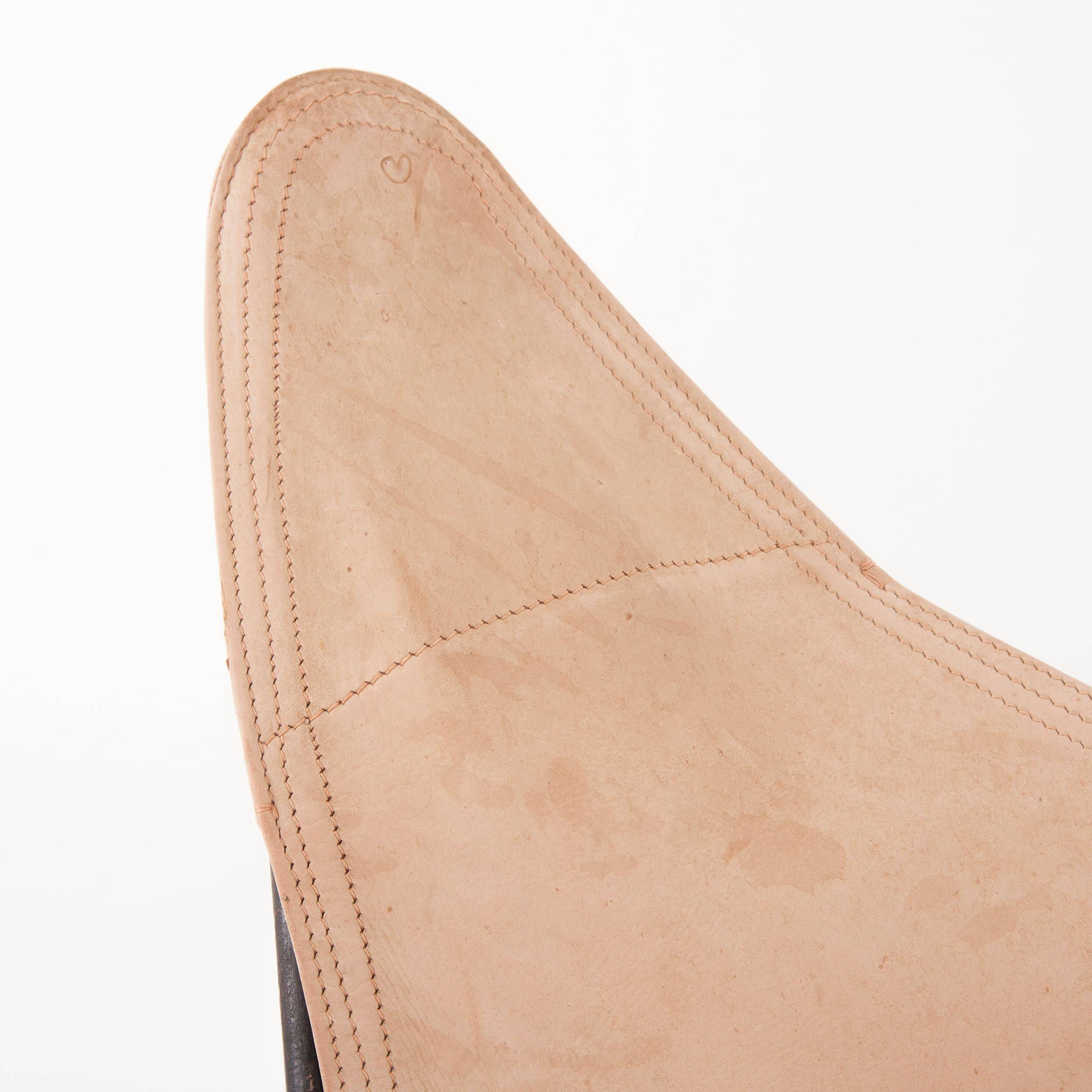 Four Fledermaus butterfly chairs in suede leather by Carl Aubock, Vienna, 1960s.