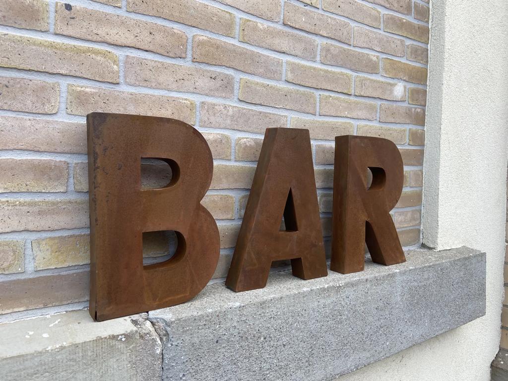 Bar sign in metal letters