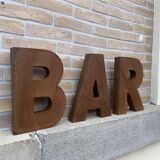 Bar sign in metal letters