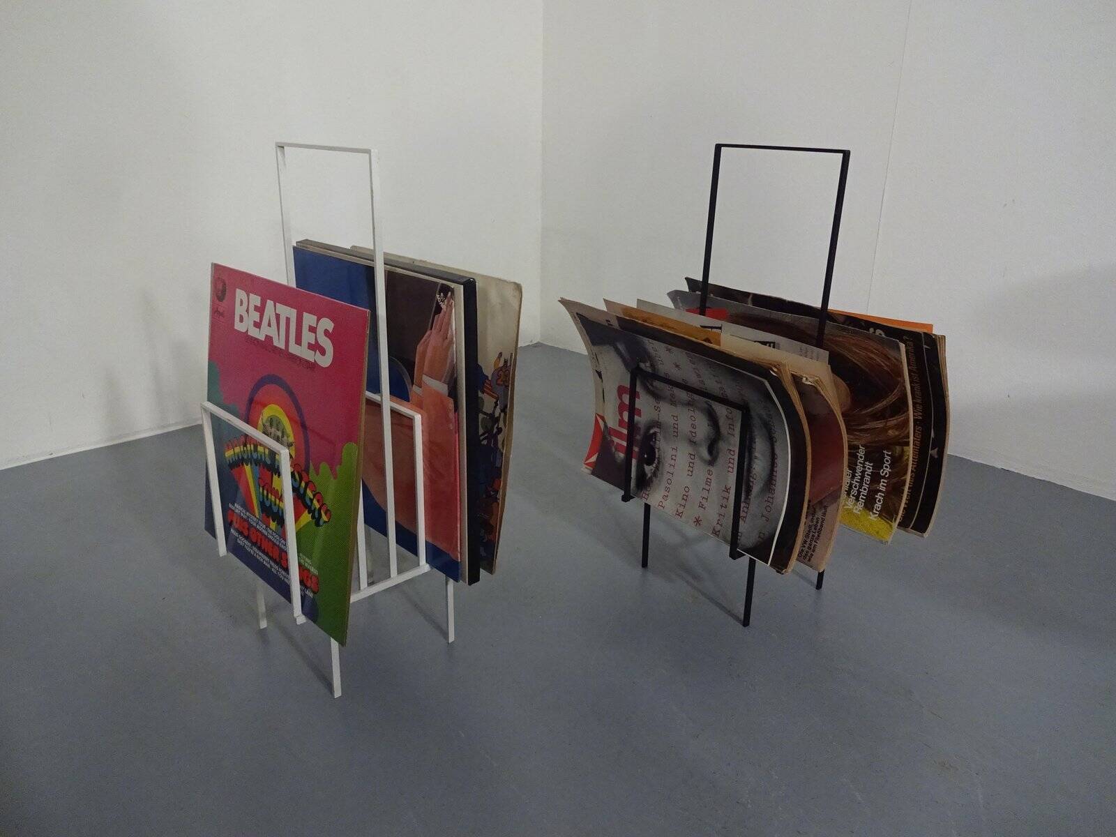 Steel magazine or record racks, 1960s, set of 2