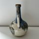 Cherry-decorated earthenware carafe