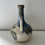 Cherry-decorated earthenware carafe