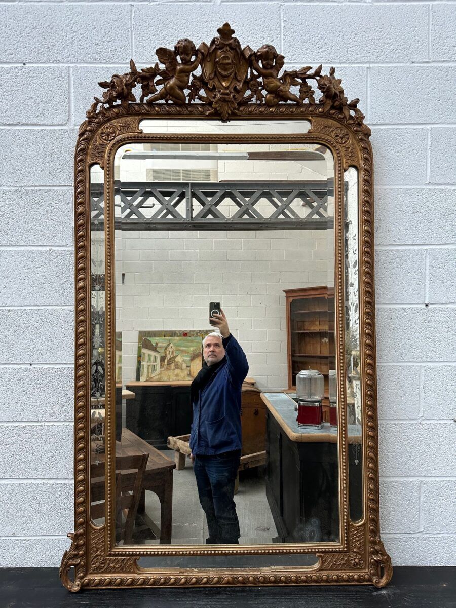 19th-century mirror with cherubs