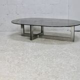 Coffee table with steel base and smoked glass slab. Circa 197