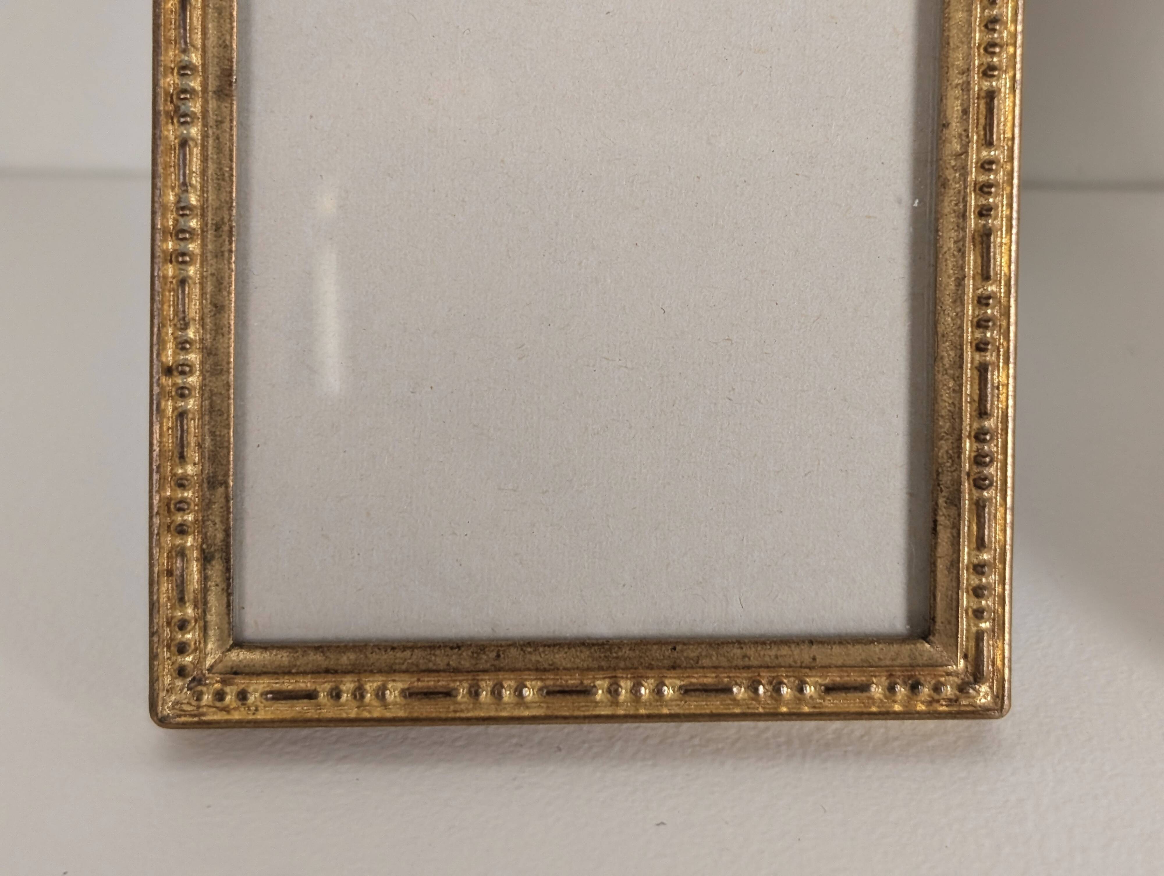Pair of gilt bronze photo frames