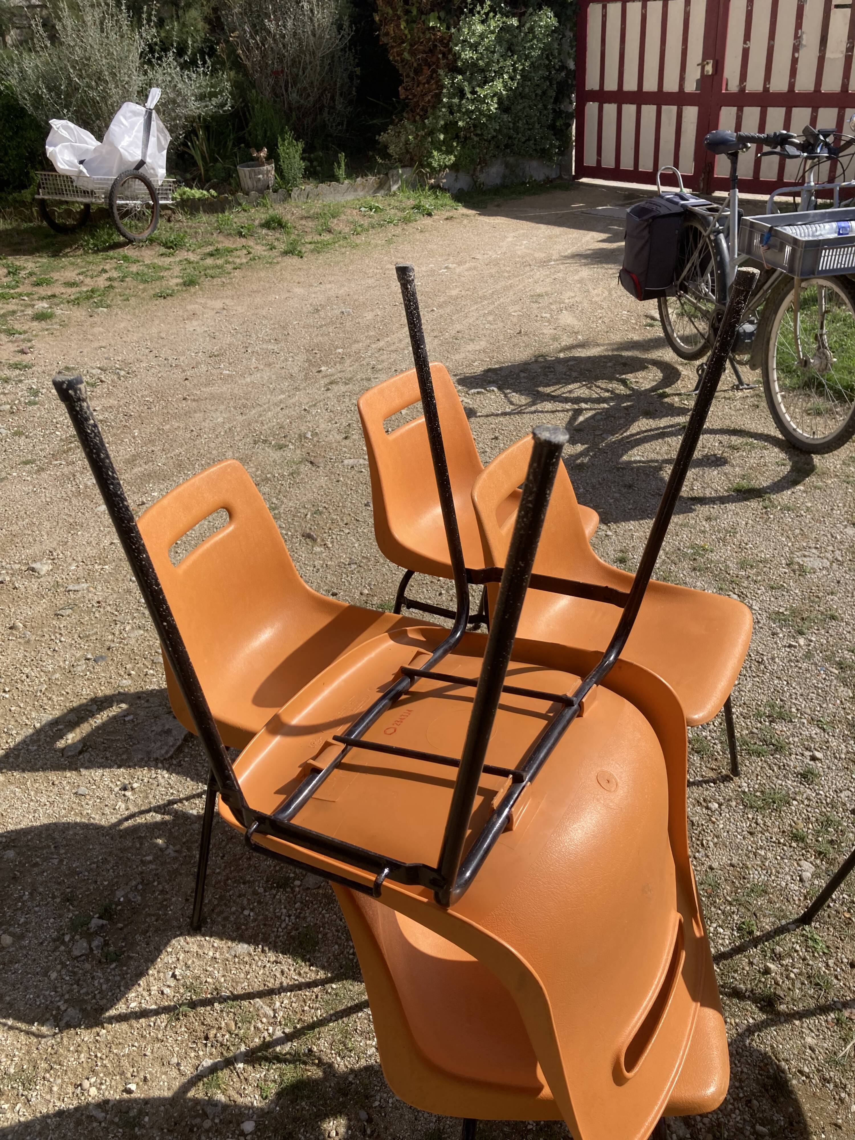 6 Grosfillex chairs from the 70s with orange shell.
