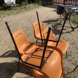 6 Grosfillex chairs from the 70s with orange shell.