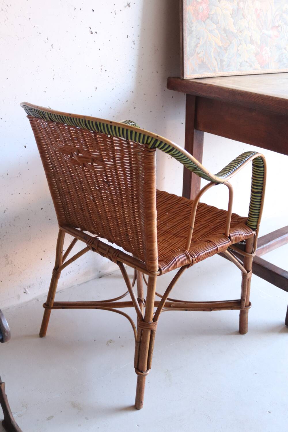 Antique two-tone rattan armchair