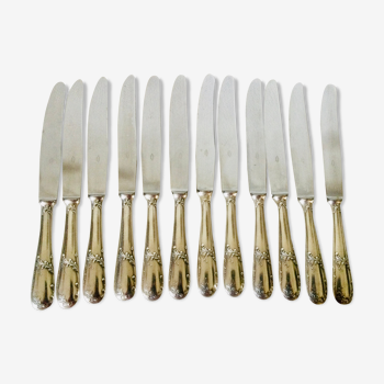 12 silver metal handle knives