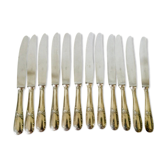 12 silver metal handle knives