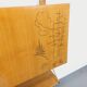 Wall shelf library with vintage light wood secretary bar