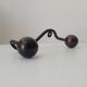 Wood and wrought iron ball coat rack from the 1950s.