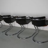 Set of four brown leather dining chairs, Willy Rizzo, 1970