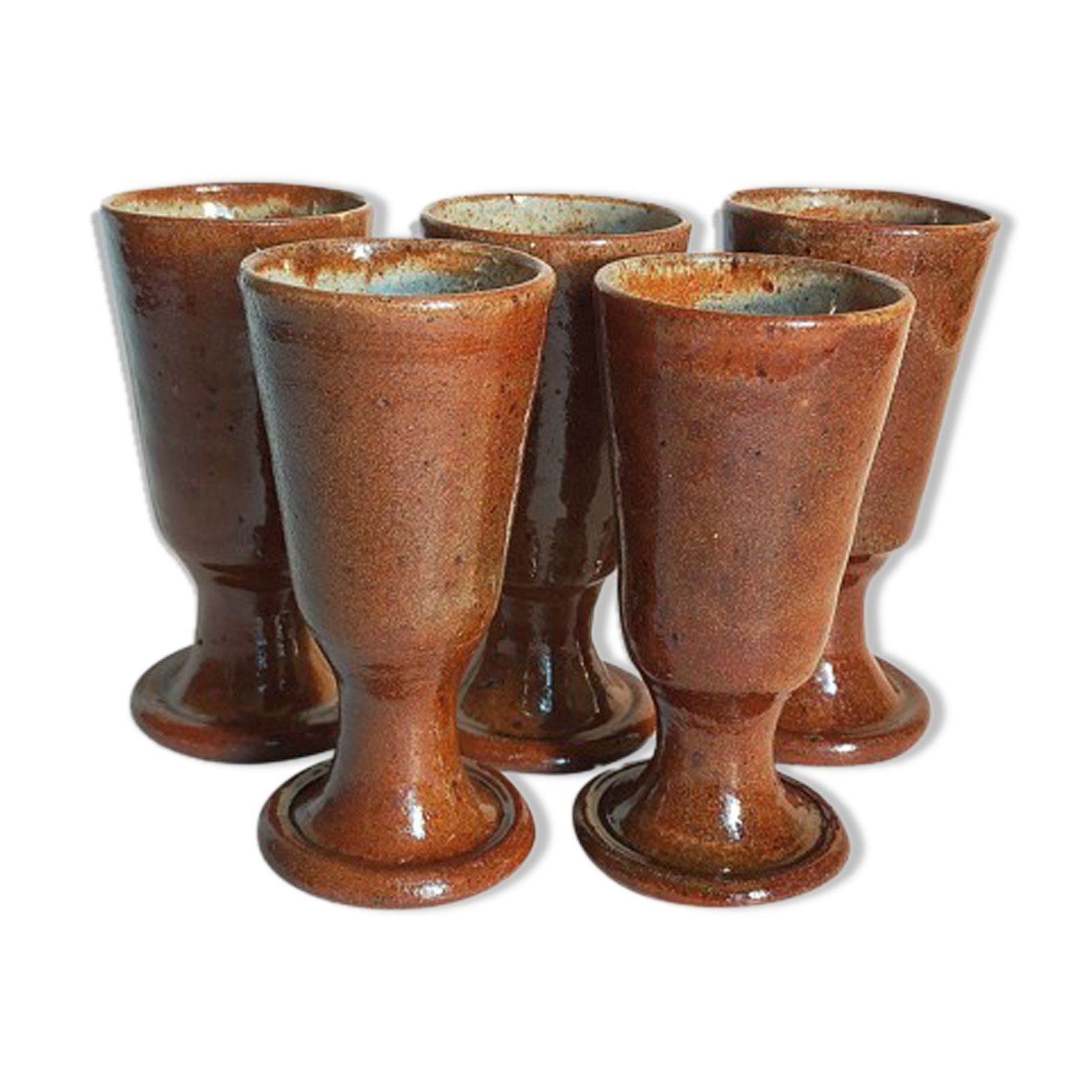 Five ancient potter's mazagrans in enamelled sandstone