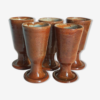 Five ancient potter's mazagrans in enamelled sandstone