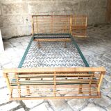 Twin rattan beds with built-in bedside tables