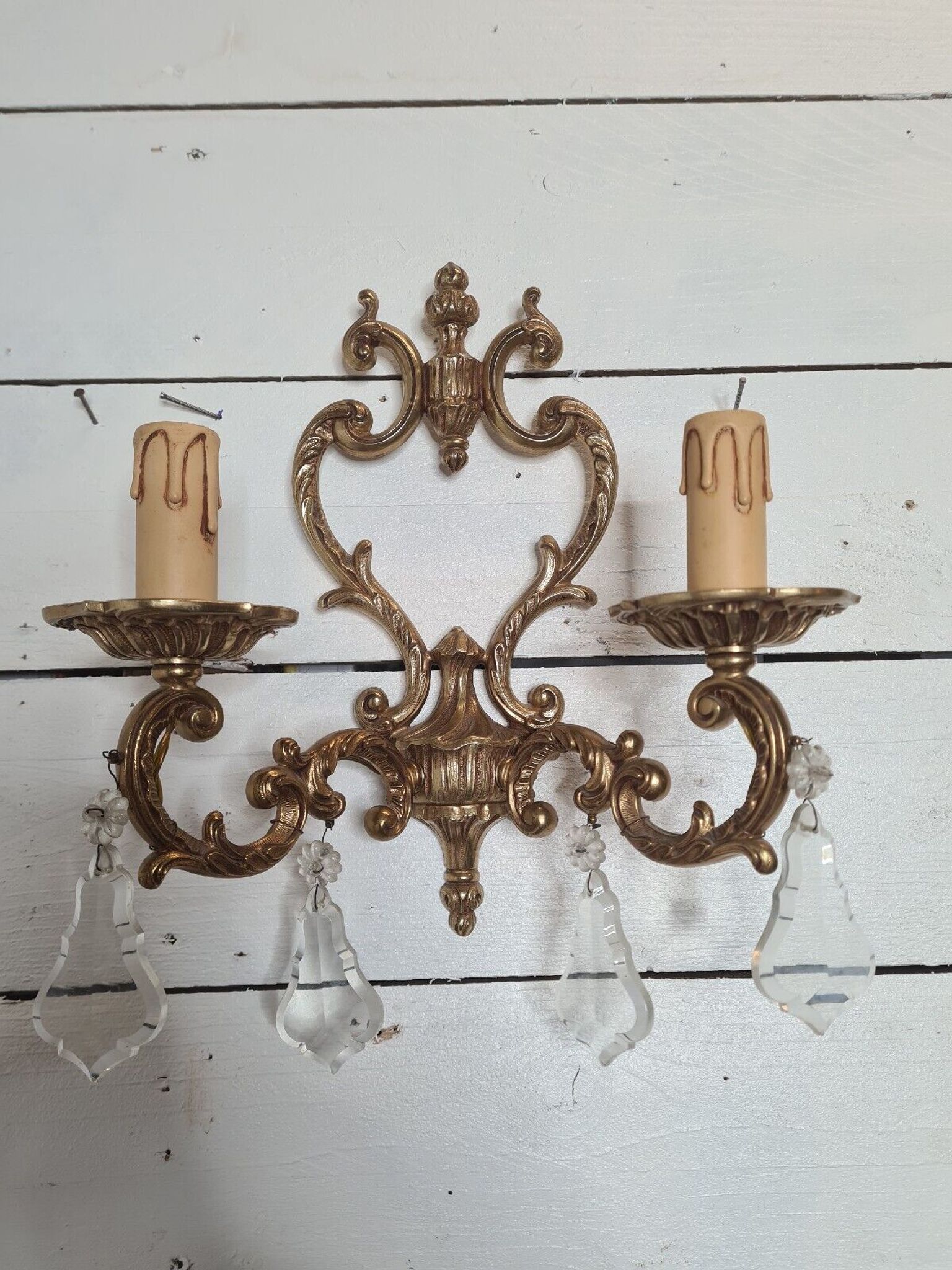 Louis XV style bronze wall lamp with tassels