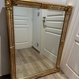 Superb gold mirror in Louis XV/XVI style. 90x120.