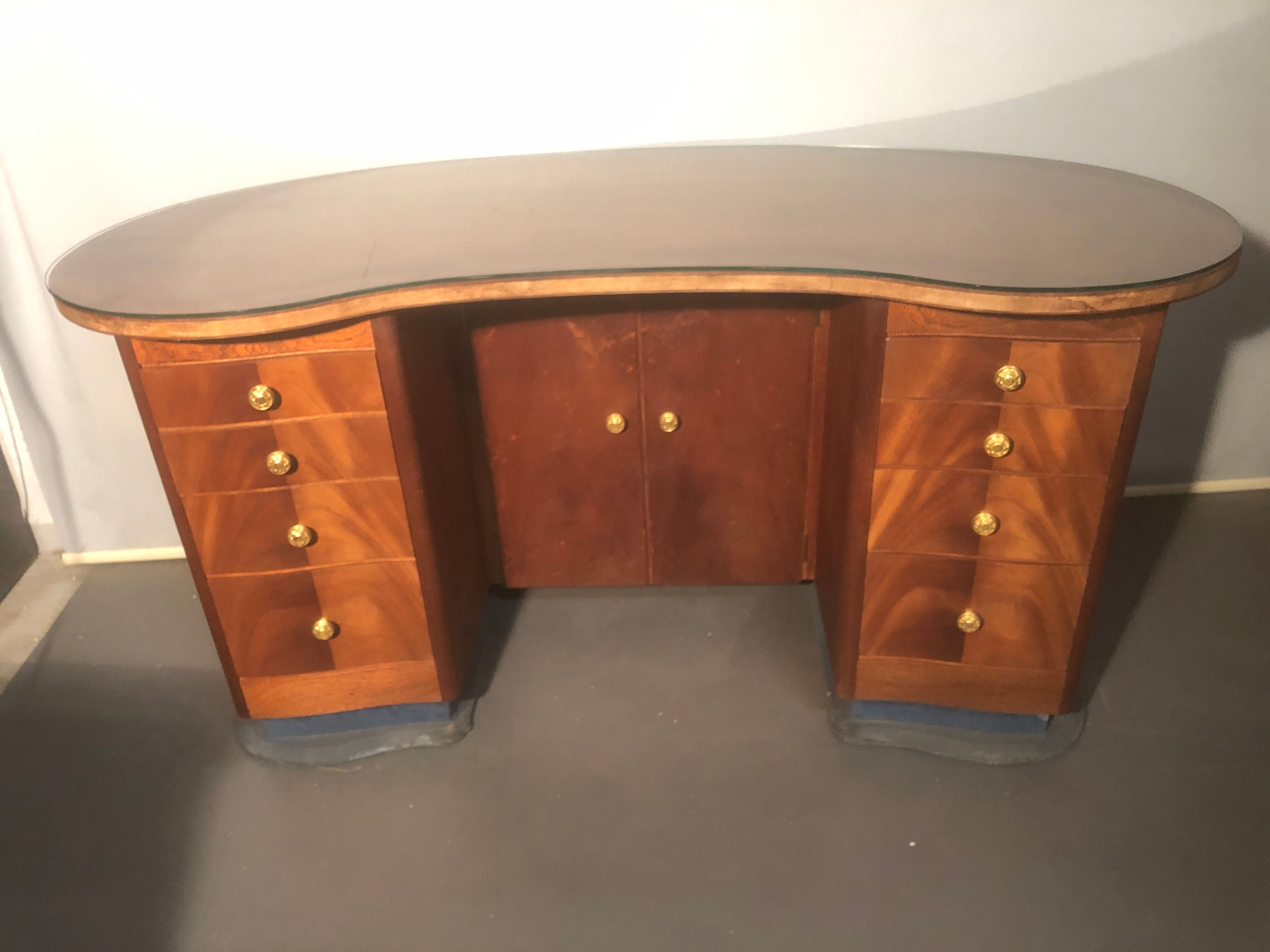 1940 desk in kidney shape with 8 drawers, 2 doors and footrest royere style
